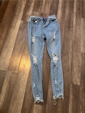 Women’s Wax Jean Light Blue Distressed Skinny Jeans. 215
